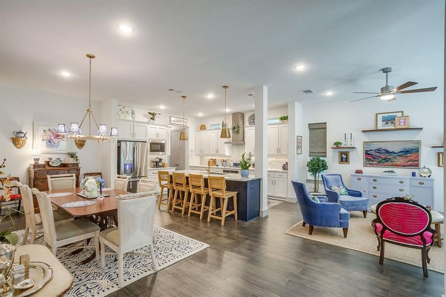 Now priced for an end of the year sale! This walkable community is in the heart of Fort Worth's River District including convenient access to the Trinity Trails! Built in 2021, this low maintenance single family home (no shared walls!) featuring 3 bedrooms, 3.5 bathrooms, 2-car rear entry garage and 3 living spaces! Thoughtfully designed, this home's highlights are the wood floors, storage space, nice size rooms, open design and custom upgrades. A guest favorite is the bar just off the dining space with custom wallpaper, hardware, wine refrigerator and bright cabinetry adding a fun pop of color and style! Walking up the custom stair-runner to the 2nd floor is a 2nd living room and all of the bedrooms with the primary suite being split from the 2nd and 3rd bedrooms. The full capacity laundry room resides on the 2nd floor  as well, while on the 3rd floor is another oversized living room, full bathroom and the best outdoor balcony you'll find! The views and the breeze from the balcony will make your sunrise coffee and your sunset happy hour a completely delightful daily experience! Not only is this home perfect for urban living on the west-side of Fort Worth, it's also perfect for entertaining and wonderfully adaptable to 2nd home, lock and leave living. Take a tour and fall in love with all that living here has to offer!