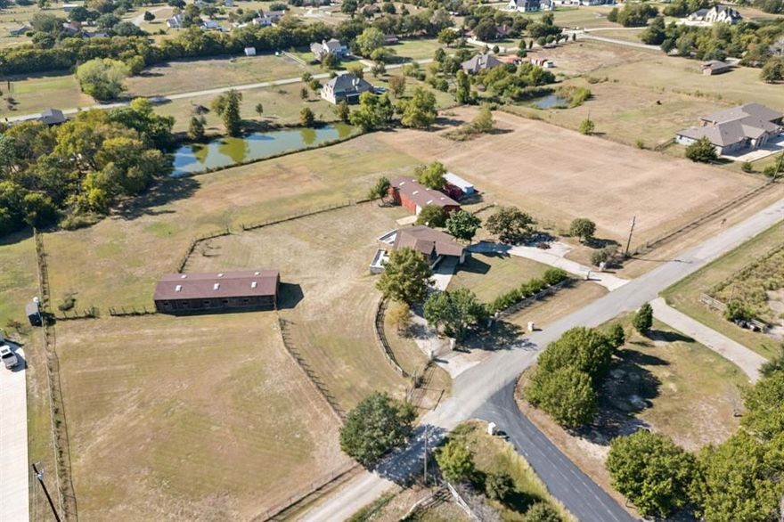 Welcome to 600 Long Road in Lucas, Texas, where the possibilities are as wide open as the land itself. This rare picturesque property is now being offered with the opportunity to purchase an additional 2.1 acre adjacent property already fenced and ready for your barnyard friends.(MLS #1086437) 
 
Parcel One – 3.75 Acres with Home and Barns is priced for land value only. 
Set on 3.75 expansive acres, this property includes an existing home ready for renovation or a complete rebuild, along with two solid steel-framed barns that just need some TLC.  The land is fully fenced and gated making it ideal for horses, chickens, and other farm animals. The home offers the perfect setting to enjoy a healthy, self-sustaining lifestyle where you can grow your own personal garden, raise animals, and enjoy the peace and freedom that comes only with true country living.

Parcel Two- 2.1 Acres of Vacant Land: is currently listed for 550,000. ( MLS# 1086437)
Adjacent to the main property, this 2.1-acre tract provides the perfect canvas for a new custom home, guest house, workshop, farm or room for your horses to roam. 
Located in a non-HOA community within the highly rated Lovejoy ISD  tucked away on a quiet street among a combination of new constructed homes  and old ranch style homes, this property combines peaceful country living with easy access to city conveniences just minutes from shopping, dining,  major highways and lake Lavon.
 Whether you envision a sprawling family compound, equestrian retreat, or future development project, this property delivers the space, structure, and setting to make it possible.