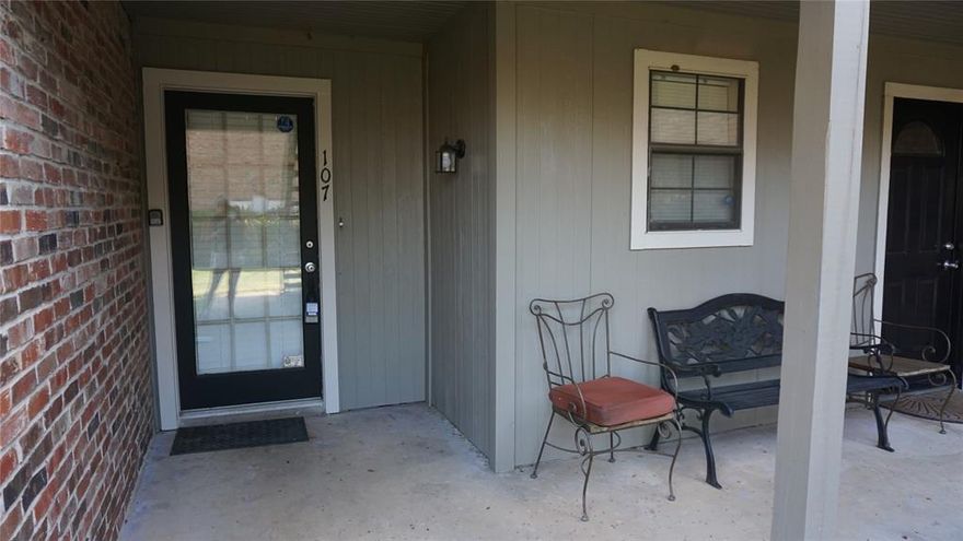 Lovely 1st floor condominium in desirable location is ready for move in.   Provides a spacious living room featuring a wood burning fireplace.  The dining area includes a wet bar with extra cabinet space.   Beautifully updated kitchen with granite countertops and all appliances included.  Washer and dryer also included.  Large primary bedroom with walk-in closet.  Second bedroom with plenty of closet space that could double as a home office.   Large bathroom with double vanity.  Covered patio to enjoy with additional storage space.  Community amenities include swimming pool and spa. Water, sewer, trash and landscaping included. River Legacy Park is within walking distance just across the street.  Don’t wait to start enjoying this 2 bedroom and 1 bath home.