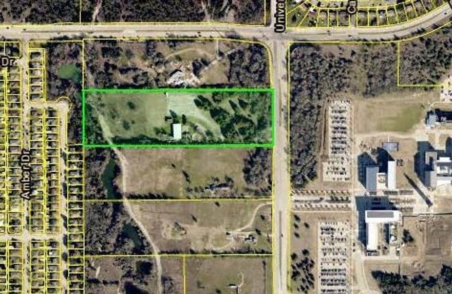 Unlock the potential of this exceptional 11-acre site, strategically located directly across from the bustling University zone. This prime piece of real estate offers a unique opportunity for mixed-use development, blending commercial, residential, and recreational spaces in a rapidly growing area. 1) Strategic Location 2) Versatile Zoning 3) High Growth Potential 4) Accessibility 5) Community Integration.