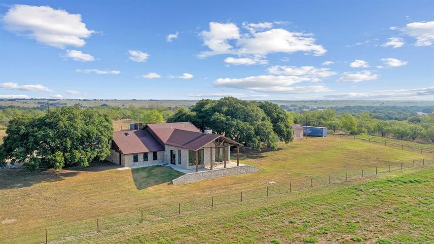 The perfect Ranch!! The Ranch has over 300 acres that is high fenced, two homes, 4 water wells, shops, sheds, feed lanes and Green's Creek running right through it! This one is truly special! Main home is fantastic, completely updated throughout, it features 4 bedrooms, 2.5 baths, two living areas and a huge exercise room or office. The outdoor living area is unbelievable, in ground swimming pool, pool house, huge covered porch and outdoor kitchen. The second home is a nice doublewide. Green's Creek run's right through the middle of the property, and this ranch has some of the very best fertile farm ground along the creek. There are 120 acres of Tifton, 20 acres of Sudan and about 20 more of Coastal Bermuda! The place has an active 2000 cow permit, and according to the owner could easily be changed to a 5000 head yearling permit! There are so many deer and turkey on this property! This place has so many ways to produce income! Come take a look and I promise you wont be disappointed!