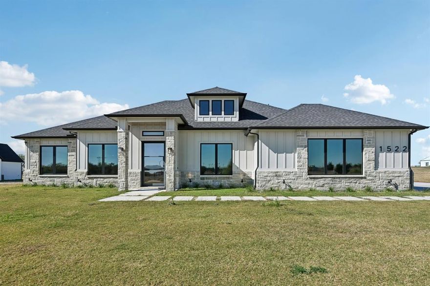 Luxury 4-Bedroom Home on 1 Acre – Royse City, Community ISD schools!

MOTIVATED SELLERS!! Built in 2024 and barely lived in, this stunning 4-bedroom, 3-bath home offers nearly 2,900 sq ft of modern luxury. Situated on a full acre in Royse City and zoned to Community ISD, it features an open-concept design with soaring ceilings, designer finishes, and natural light throughout. The gourmet kitchen boasts upgraded stainless steel appliances, granite countertops, custom cabinetry, and a large island perfect for entertaining. The spacious primary suite includes a spa-like bath with a luxury walk-in shower, freestanding soaking tub, and dual vanities. Enjoy peaceful country living with easy access to shopping, dining, and major highways. Move-in ready and available to show today! Do not miss out on this opportunity to live the country life away from the city. Easy access to commute to Dallas and far enough away to enjoy a quiet country night.