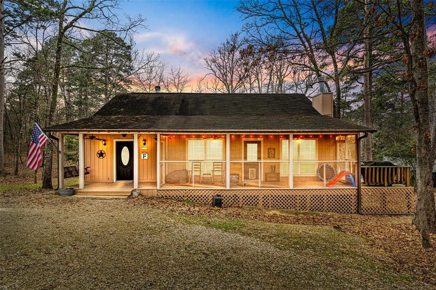 Enjoy this darling 2 bedroom & 2 bath home on two lots with two living areas and two wood burning fireplaces. There is alsoflex space currently being used as a nursery - has previously been used as an office, could be a craft area, play area,workout area... you decide. Outside you can enjoy the beautiful nature of Holly Lake Ranch on the screened-in front porch,open side porch or right out the primary bedroom door onto the back porch. Home has recently been painted inside. Kitchenfloors and front bathroom floors also recently replaced. Holly Lake Ranch is a private gated community with  security, 18-hole golf course, disk golf, multiple swimming pools, pickle ball, tennis, basketball, putt putt, playground, maintained walkingtrails and many more amenities and activities.