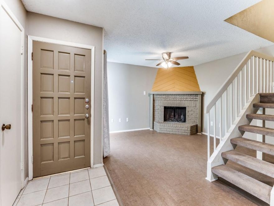 Wonderful opportunity to put your own cosmetic touches in a condo PRICED TO SELL in a convenient, gated, North Dallas location. Complete with all appliances- STAINLESS STEEL FRIDGE, WASHER AND DRYER INCLUDED! Recent updates include NEW GRANITE COUNTERS and NEW TILE BACKSPLASH in the kitchen, and a NEW ELECTRIC PANEL. The home is ready for your personal touches! There are two large bedrooms upstairs with an ensuite bath and walk in closet in the primary, and an UPDATED half bath is conveniently located downstairs. The covered carport leads right into the home, and one of the two quaint community pools is right next to the condo.