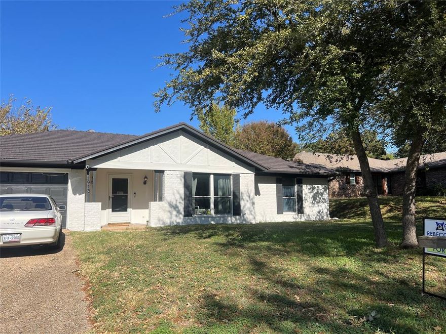 Beautiful updated 3 bed, 2 bath home with freshly painted brick exterior, metal rood, and new quartz countertops in kitchen and bath.  Spacious fenced bbackyard.  Located in a quiet, established neighborhood near schools, parks and shopping- move-in ready and full of charm!