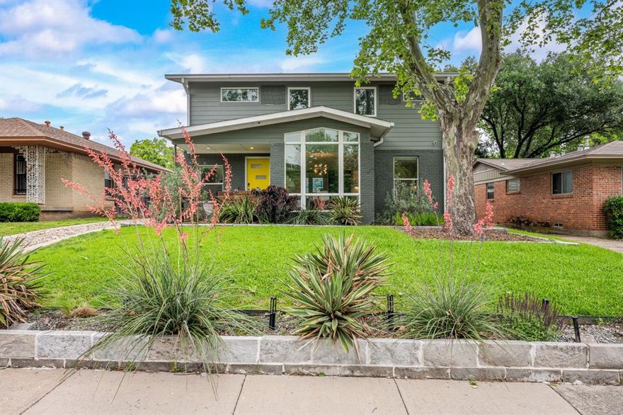Mid-century modern style meets modern luxury in this fully remodeled Oak Cliff stunner near the vibrant Bishop Arts District, complete with a private guest quarters! 2,333 SF MAIN HOUSE + 515 SF GUEST QUARTERS! Thoughtfully updated throughout, this light-filled home features oversized windows, rich hardwood floors, and a seamless open-concept layout that blends style and functionality. 

The sleek kitchen is outfitted with a large island, Bosch appliances, including a gas range, two dishwashers, under-cabinet lighting, and a spacious walk-in pantry. The living room flows easily into the dining area, laundry, mudroom and backyard. There is a second living area downstairs great for a den, gym or office!

Upstairs, a dedicated office landing offers a functional workspace in addition to the three upstairs bedrooms. The spacious primary suite features dual vanities, a massive shower and clawfoot tub. Smart features abound, including Lutron lighting, electric shades, and windows that are UV film protected, offering both energy efficiency and peace of mind.

Outside, the detached two-car garage (with carport and upgraded voltage) includes fully equipped guest quarters above—complete with kitchen, bath, and Murphy bed, ideal for visitors or rental income.

The private backyard is a true oasis with a heated stock tank pool, large deck with built-in seating, and a grilling area that makes entertaining a breeze. Don’t miss this rare opportunity to own a stylish, turn-key home with exceptional indoor-outdoor living and guest accommodations in the heart of Oak Cliff.