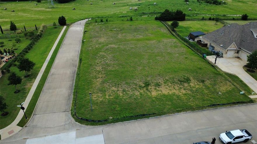 Rare opportunity to own a spacious 0.79-acre corner lot in the highly desirable Falcon Point community in Heath, TX. Nestled in an established luxury neighborhood, this homesite offers the perfect balance of privacy, space, and convenience—ideal for building your custom dream home or securing a long-term investment in one of DFW’s most sought-after lake-adjacent markets.  
Located just minutes from Lake Ray Hubbard, this property provides easy access to waterfront dining, marinas, scenic trails, and outdoor recreation, while still being a short drive to shopping, dining, and major commuting routes into Dallas.  
Zoned to Rockwall-Heath ISD, known for its strong academic reputation, this lot is positioned for both lifestyle and long-term value.  
Bring your own builder and design a home tailored to your vision—whether that’s a modern estate, traditional build, or something entirely unique. With surrounding homes approaching the $800K–$1M+ range, the upside potential is clear for both end users and investors looking to capitalize on Heath’s continued growth.
If you’ve been waiting for the right lot to build in Heath, this is one of the few remaining options that checks both the lifestyle and investment boxes.