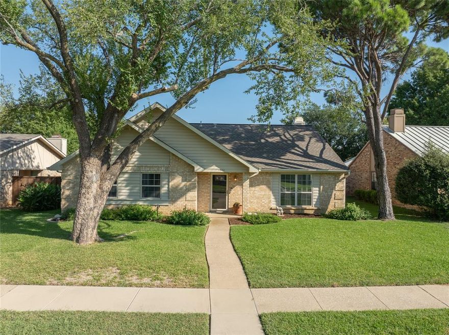 Beautifully Maintained One-Story Home with Pool in Desirable Flower Mound. Welcome to this charming 3 bedroom, 2 bathroom home located in the highly sought-after Flower Mound community and top-rated Lewisville ISD. Just a short walk to Flower Mound Elementary, this home offers convenience and lifestyle with shopping, dining, and groceries only minutes away. Inside, you’ll find a freshly painted interior with brand-new carpet and a thoughtfully designed flexible layout featuring 2 spacious living areas and 2 dining areas—perfect for entertaining or creating a home office, playroom, or workout space. The well-maintained kitchen and living spaces flow seamlessly, while the large windows invite in natural light. Step outside to your private backyard oasis with a gorgeous pool with plenty of space for relaxation or gatherings. Additional highlights include a large garage with built-in shelving, beautiful manicured curb appeal, and a peaceful setting in one of Flower Mound’s hidden established neighborhoods .This move-in ready home combines comfort, functionality, and location—don’t miss it!