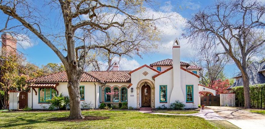 This stunning Spanish-style home, designed by renowned architect Richard Drummond Davis, is a gem located in the heart of Preston Hollow on a quiet tree-lined street. Spanish and Mediterranean style accents make this custom home extremely unique. The exterior features hard-cut stucco with Canterra stone trim accented by a beautiful tile roof and custom-crafted doors. Inside, the home boasts Saltillo tile floors, wide plank pine floors, arched doorways, pocket doors, museum finish on walls with art lighting, and speakers throughout. An elegant iron staircase adds to the charm. Spanning over 4,500 square feet, the residence includes 3 bedrooms and 3.1 bathrooms, as well as multiple living areas with fireplaces, including a dedicated office and exercise room. Enjoy two dining areas, a formal living room paired with the sitting room, and a breakfast room. The property features smart home technology and a smart lighting system. The large kitchen is equipped with stainless steel Viking & SubZero appliances and beautiful cabinetry, featuring two sinks, a large island, double ovens and a butlers pantry with wine fridge. The master suite includes a sitting area and a spacious en-suite bath and WIC, along with an exercise room and direct access to the laundry room. Both secondary bedrooms have their own en-suite bathrooms. Double doors allow a perfect flow to the outdoor area featuring built-in grill, tile fountain & wood-burning fireplace in the open courtyard and fans over the covered patio for added comfort. A screened-in porch off the master bedroom provides a lovely sitting area. The private turfed backyard also includes a putting green, perfect for leisure and relaxation. Ample parking features include a 3-car garage and covered parking off kitchen behind privacy gate. Property is part of a voluntary HOA. It is walking distance to St Marks. There is walking access to the campus through a neighborhood street avoiding Preston.