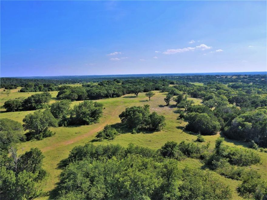 A Recreational Oasis! Diverse 900 Acres with rising elevations, varied terrain, plethora of wildlife and an abundance of water resources, as a result, the Texas Hill Country is on true display. The main home is an exquisite ranch style 2,800 square feet home, that lacks no detail and with the spacious front and back porches you'll be able to enjoy picture perfect views of the lush valley, rich with wildlife. Not far from the main home is the relaxing 450 square feet guest house with wood burning stove. Abundance of Water: Over a mile of Sycamore Creek going through the ranch, lined with mature oak trees make a bounty for wildlife. Several large ponds and a very productive windmill supplying water to the high elevations. The current owner has the property well maintained for hunting or livestock with several fields for grazing and several custom game feed plots. There are native-whitetails, turkeys, feral hogs, doves, ducks and all kinds of non-game species making for great hunting.