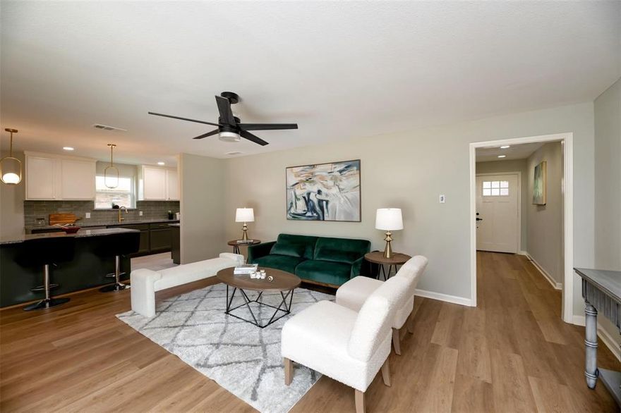 Beautifully updated home in a great neighborhood close to highway 635. The home offers an open floor plan with 2 living and dining rooms and large bedrooms. The kitchen adjoins the living room with an island that has a breakfast bar making a perfect place to entertain. Updates completed May of 2025 include a new 30 yr roof, vinyl double paned windows, paint inside and out, all flooring, granite counter tops, stainless appliances, back splash, all plumbing fixtures and light fixtures, water heater, cabinet and door hardware, front door, tub, toilets, sinks, and much more! The front has a circle driveway making parking convenient and the back has a rear entry garage. Attic insulation has been added to help with energy efficiency.