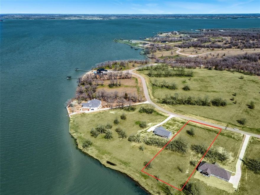 Lakefront opportunity with lots of waterfront footage at Admiral Shores, located on the shores of beautiful Richland Chambers Lake, one of the largest lakes in Texas!! Build your dream home on this lot with plenty of lake front shore and gorgeous lake views!! Enjoy the beautiful sunsets with several large trees already established. Water is deep enough to build a boat slip and paved roads are in.  Utilities are available now and some new owners are already building their homes on the lakefront lots. Only an hour from downtown Dallas! Don't miss this opportunity!