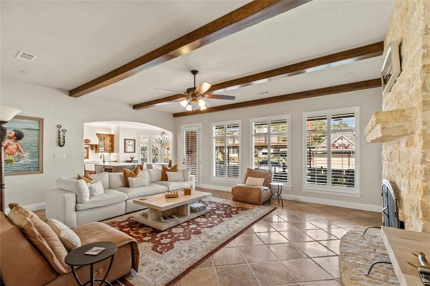 Step inside to lakefront luxury in one of the most sought after communities on Cedar Creek Lake.
This property features elegance, charm and well thought out finishes. Built by well known custom home
builder Whiddon Homes with sophistication in mind. Extensive remodel completed in 2021 boasting leather
granite countertops throughout, plantation shutters, updated bathrooms, Travertine tile, hardwood, and
carpet, Sub-zero refrigerator and wine chiller, Cove dishwasher, Wolf induction cooktop and microwave are
just a few of the high end features. The primary bedroom with a water-view and ensuite bath are downstairs
with an additional bedroom and full bath downstairs as well. Upstairs you’ll find two additional bedrooms
with water views and a shared bath, second living area, game room and another large media room with a
projector for entertaining guests --- includes surround sound in living area, master bedroom, patio and the
upstairs game room. The large covered composite decked patio offers a serene setting enjoy your morning
coffee or an evening glass of wine. Newly installed boat dock with party deck includes a single slip boat slip
and custom lift for personal water craft. Lovely landscaping, new roof, gutters, window screens, dock, deck
and freshly stained garage doors all completed in 2024. Generac generator installed in 2021, HVAC units
replaced in 2020 with a 10 year warranty on most parts. Oversized 3 car garage is temperature controlled
with a split AC unit, epoxy flooring throughout garage. Dusk to dawn lighting on the front of the home, dock
and stairway. Watercraft, golf cart and some furnishings included. Seller to provide list of exclusions.
Located in the Pinnacle Club a guard gated community with restaurant, swimming pool, tennis, pickle ball
courts, play ground, 19 hole golf course and boat launch.