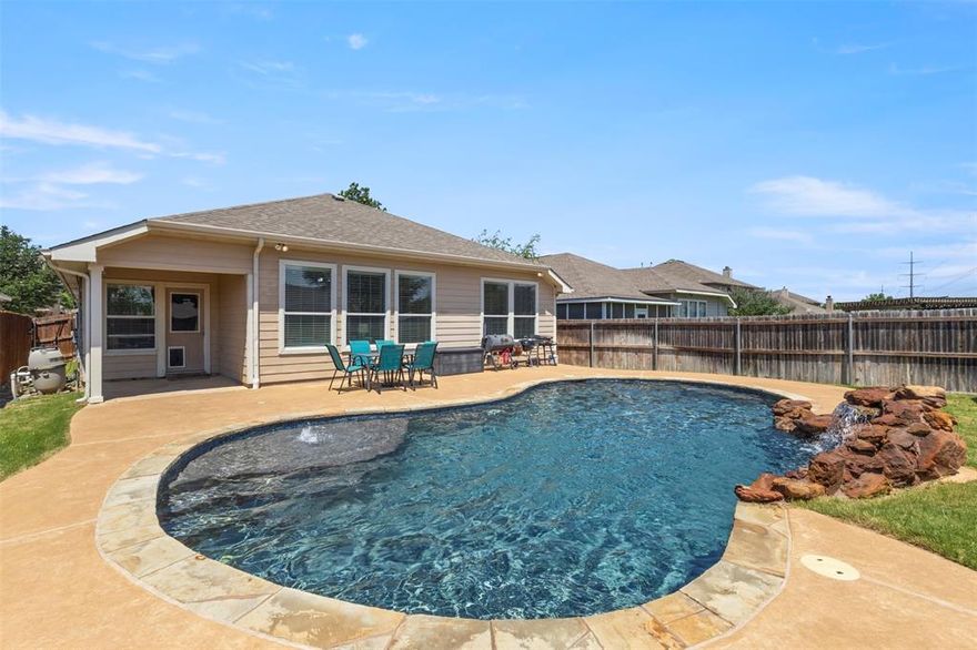 HARD TO FIND SINGLE STORY WITH A POOL, GREENBELT LOT IN KELLER ISD! Home features a thoughtfully designed layout with large living areas, abundant natural light, and updated finishes throughout. Spacious kitchen is open to the living and eating area, ideal for both everyday living and entertaining. Wonderful floor plan features 4 bedrooms or 3 bedrooms with dedicated office. Step outside to your private backyard retreat, complete with a sparkling saltwater pool and hot tub—perfect for relaxing or hosting gatherings year-round. Neighborhood playground is located at end of the street for easy accessibility. Recent updates include new carpet and hot water heater. Conveniently located near shopping, dining, and major roadways, this property combines accessibility with a peaceful residential setting. This is a wonderful opportunity to enjoy refined living in a welcoming community.