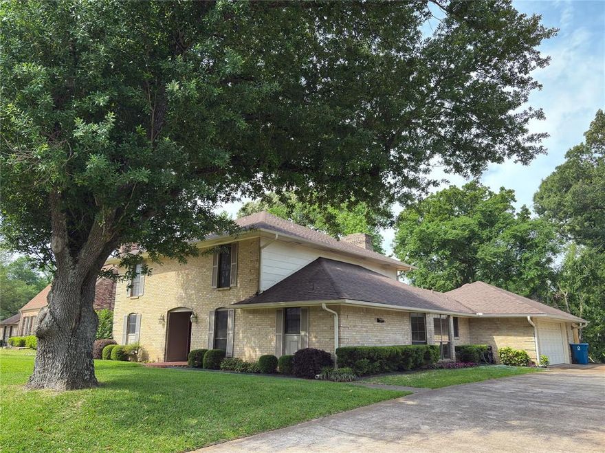 PRICE CUT!! !Walk into this stately 4-2-1 -5-2 Garage Brick home with rich wood overtones located at the edge of town on a cul de sac. This 1-1-2story home with a large room living room with tall ceilings and a WBFP. It opens onto the enlarged open deck. The living room flows into the breakfast area with a bay window plus multiple built ins that included a hutch and desk. The large   features many cabinets and counterspace. The formal dining room could be converted into a game or office area. The roomy downstair primary bedroom with a large walk in closet. The primary bath is a woman's dream with a sunken tub. Walk in closet large separate vanities, many cabinets and drawers plus a walk in closet. The upstair bedrooms features a full bath, one of the bedrooms has a built in gun cabinet. Laundry room and half bath conveniently located off the garage  entrance from the wood deck. With the updated large deck there is a storage area.