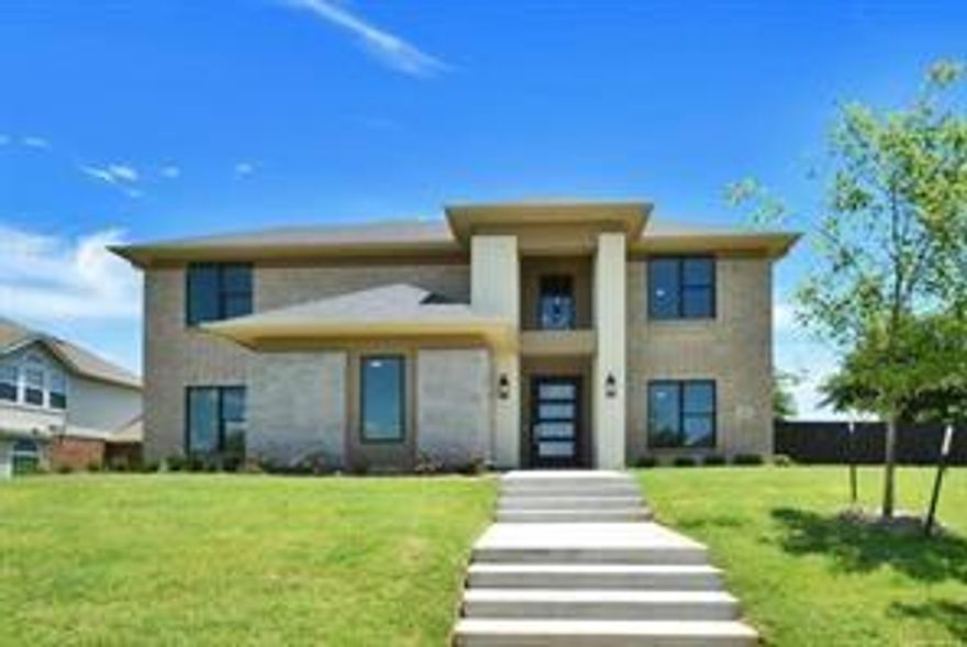 Ready to move in.  Amazing Designer Custom built home. A spacious and contemporary model known as the Sapphire This model is perfect for active and growing families, with open concept living spaces and premium finishes.  Two tone kitchen with designer cabintes.  Glass door pantry with light. The primary bedroom and an additional bedroom are located downstairs, each with a full bathroom. The primary bathroom includes dual sinks, an oversized shower, a luxury free standing tub, and a fantastic closet. On the first floor, you will also find the family room, kitchen, and dining area with plenty of space. The upstairs includes two additional bedrooms with their own full bathroom, a second living area, a media room, and wet bar. The home comes standard with premium finishes, including a walk-in pantry, butler's pantry, oversized windows and front door, and 20' ceilings. The office space is located at the front of the home and can be repurposed to fit other needs if desired. Come tour this spectacular home! Builders upgrades are our standards