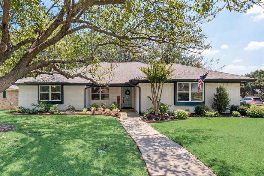 Back on market as buyer financing fell through 2 days before closing. Located in the heart of Mansfield and within the coveted Mansfield ISD, this stunning open-concept home sits on a large corner lot with beautiful landscaping, mature trees, and numerous upgrades throughout. Upon entry, you'll find a spacious living room with built-ins that seamlessly flows into the dining area and the fully remodeled oversized kitchen. The gorgeous kitchen features updated granite countertops and backsplash, a large composite granite sink, an upgraded induction cooktop, upgraded double ovens, a Butler's pantry with granite countertops and laundry area, and a custom-built island with bar seating, pull-out storage, trash can access, and a pull-out pan and lid rack.The upgraded primary suite includes an oversized bedroom with an accent wall and a bathroom with a walk-in steam shower, an oversized garden tub, and dual vanities. The backyard is perfect for entertaining.