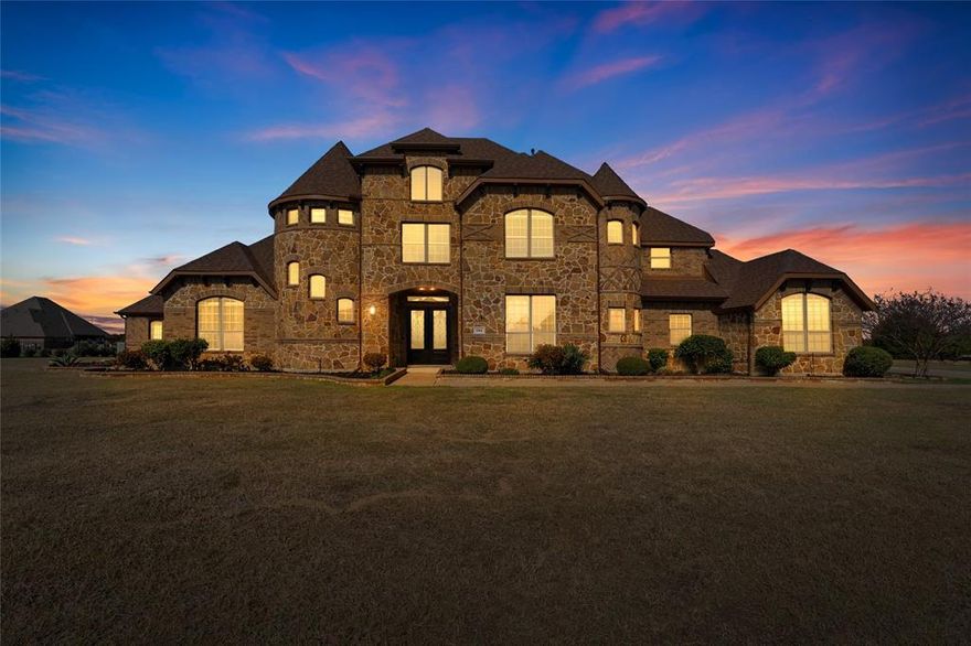 Welcome to an extraordinary estate nestled within the prestigious Kensington Park private subdivision, where elegance, space, and refined design come together seamlessly on nearly 2 acres of beautifully positioned land. Boasting 5,357 square feet, this remarkable residence offers 5 spacious bedrooms, 5.5 bathrooms, and three expansive living areas, thoughtfully designed to accommodate both luxurious everyday living and grand-scale entertaining. From the moment you step through the impressive entryway, you are greeted by soaring ceilings ranging from 8 to an impressive 25 feet, creating a dramatic sense of openness and architectural sophistication. The home is adorned with 8-foot doors throughout, enhancing its upscale presence and flow. At the heart of the home lies a newly remodeled grand luxury eat-in kitchen, a true showpiece designed for both beauty and functionality. This space features: Two oversized islands,Elegant marble countertops. Custom high-end finishes, Premium stone flooring, Double ovens,Upgraded designer lighting and stunning chandeliers.The kitchen seamlessly opens into the main living areas, offering the perfect setting for entertaining and gathering.Retreat to the newly painted theater room, complete with built-in cabinetry, creating an ideal space for movie nights or private relaxation. The primary suite offers a serene escape, while additional bedrooms provide generous space and comfort for family or guests.
Step outside to appreciate the expansive grounds and the extended, redesigned driveway, capable of accommodating 10+ vehicles, ideal for hosting  Additional highlights include: Recently replaced roof (less than 1 year old) Over $130,000 in upgrades throughout,Private, tranquil setting within an exclusive community This is more than a home—it is a statement of luxury living, thoughtfully curated for those who appreciate space & quaality. Showings are by appointment only.