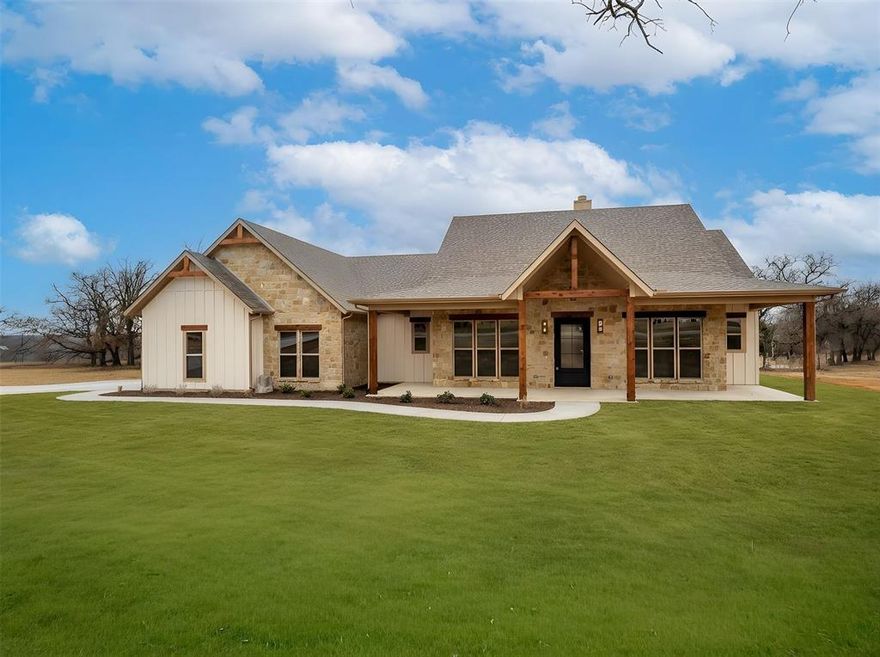 JOHN SCHEDCIK CUSTOM HOME! Welcome to this stunning 3-bedroom, 2.5-bathroom home with an office, offering 2,194 square feet of beautifully designed living space and a 3-car garage. From the moment you walk in, you’ll be captivated by the impressive open living and kitchen area—perfect for gathering with family and entertaining guests. The kitchen is truly the heart of the home, featuring a large island, abundant cabinet storage, generous countertop space, stainless steel electric appliances, and a spacious walk-in pantry that makes organization effortless. The living room is both cozy and elegant, highlighted by a striking wood-burning fireplace tiled all the way to the ceiling and complemented by custom built-in cabinets, creating the perfect focal point for the space.The primary suite is a relaxing retreat, filled with natural light and offering a beautiful en-suite bathroom with dual sinks, a soaking tub, and a separate shower. A convenient connection to the laundry room adds thoughtful functionality to the home. The split floor plan places the two additional bedrooms on the opposite side of the home, connected by a Jack-and-Jill bathroom. An office located at the front of the home provides an ideal space for those who work from home or need a quiet place to focus. Every corner of this home showcases attention to detail and thoughtful design that will have you swooning at every turn. Situated on a corner lot in the highly sought-after Paradise ISD, the property also features an extra-large front porch and back porch, perfect for enjoying peaceful mornings or relaxing evenings. A bonus storage space off the back porch adds even more convenience.
This home offers the perfect blend of comfort, style, and functionality—don’t miss your opportunity to make it yours. Schedule your showing today!