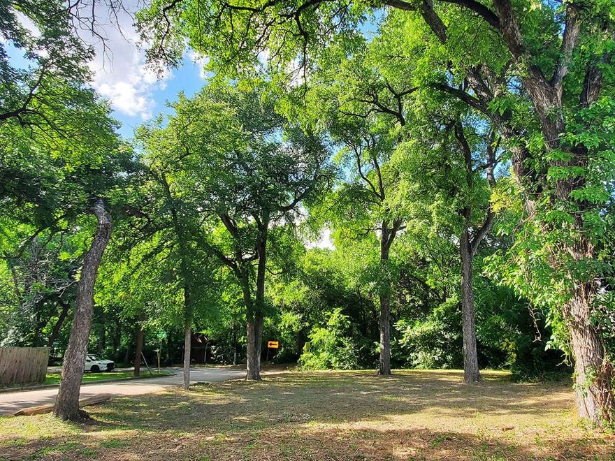 1710 Goyens Drive, Dallas, TX 75224 [Lot 1 of 2]
Lot size: 4,814 square feet
Zoning: R-7.5(A) - Single Family Residential
Price: $110,000
Flat residential lot shaded by mature cedar elms ready to build on. Perfect for someone who loves
urban life but also loves nature and the feeling of being ‘away from it all’. Only 8 minutes from
Downtown Dallas, Bishop Arts District, and Cedar Crest Golf Course. The shops and restaurants
of Wynnewood Village are close enough to access without a car, as is Beckley Club Estates with
its peacocks and nostalgic architecture. Great location for Airbnb.
Property overlooks a large forested lot and has potential skyline views of Downtown Dallas from
third floor or rooftop. It is in an established neighborhood (Beckleywood), is platted, and has city
water, sewer, and utilities. Property is platted as 2 lots: a large lot (4,814 sq ft) and a small lot
(1,839 sq ft). Both are available. This listing only includes the Large lot.
Property owner is an internationally published nature-friendly home designer who helped start the
modern home trend in Oak Cliff and would love to help someone create their dream home here.
Plans of the home he designed for himself on this lot are available if desired, and photos of some
of his affordable modern homes (typically $150 to $200 sq ft) are included for reference.