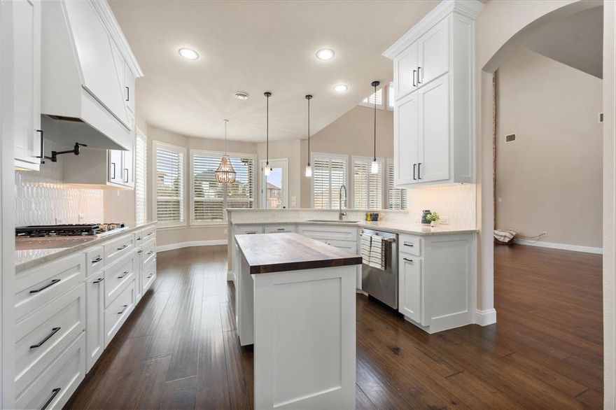 Seller is offering a $10,000 concession for the buyer to use in the way that works best for them, including closing costs, interest rate buy-down, or other allowable buyer expenses.
925 Sandy Hill in Burleson, where thoughtful design, functional space, and inviting outdoor living come together beautifully. Plantation shutters throughout add timeless style and natural light control, while custom lighting enhances the dining and living areas. The kitchen is equipped with Café stainless steel appliances, a gas cooktop with pot filler, movable island, and butler’s pantry offering additional prep and storage space.

The primary suite features a spacious wet-room style shower designed for comfort and convenience. Upstairs offers four bedrooms along with two separate living areas, creating flexible options for work, play, or relaxation. Storage space is abundant throughout the home.

Step outside to enjoy the backyard retreat featuring an in-ground pool and spa, outdoor fireplace, additional concrete parking, and a gas grill. A removable security pool fence adds flexibility for outdoor enjoyment.

This home offers a combination of comfort, functionality, and entertaining space ready for its next owner to enjoy.