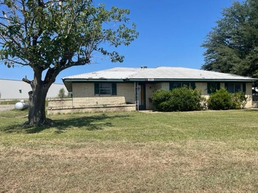 Investors and handyman's special! This one of a kind home needs a lot of TLC to return to it's former beauty, but with repairs and updates could be a wonderful place to raise a family. Conveniently located right off of FM 1570 and I30 you have immediate access for a quick commute. The separate detached garage could make a terrific home office or workshop. This home is being sold As-Is the seller will make no repairs. Buyer will need to furnish a new survey.