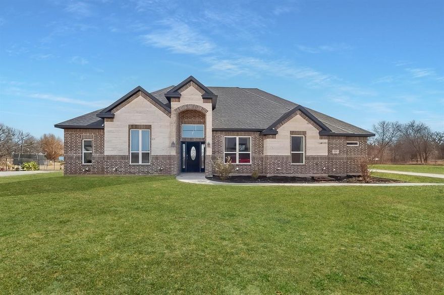 OVER 2 ACRES - NO HOA- OUTSIDE CITY LIMITS!!! Welcome to 129 Altom Rd, a beautiful custom built home in Springtown sitting on over 2 acres!!  Featuring 4 bedrooms plus an additional office. Offering modern finishes with lots of upgrades and an open-concept layout. Spacious living area features soaring ceilings, stone fireplace and abundant natural light. Chef’s kitchen includes quartz countertops, large island, custom cabinetry, and stainless steel appliances. Private primary suite with dual vanities, dual entry walk-in shower, separate tub and generous closet space. Well-sized secondary bedrooms, dedicated laundry room, and 2-car garage. Situated on 2 spacious lots with a pond and with plenty of room to enjoy peaceful country living while still convenient to town.