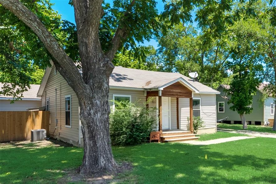 Fall in love with this charming renovated 1935 home in the heart of Van Alstyne. This area is a mix of older and newer homes with lots of pride of ownership all around.  The home is light and bright open concept with all new flooring and fixtures, fully renovated bathroom, added closets and laundry room. Home is super clean and move in ready. New fence with gate leading to lovely large shady backyard with detached 2 car garage which has lots of storage space. You won't want to miss this one!