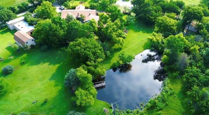 Discover a rare opportunity in the heart of Copper Canyon! Over 7 private, fenced acres offering endless possibilities in one of North Texas’ most sought-after areas. This is truly a land-focused opportunity, ideal for those looking to build, expand or reimagine their dream property. Whether you choose to renovate using the existing footprint or start fresh with a custom farmhouse vision, the setting itself is the true star.
Perfect for hobby farmers, equestrians or anyone craving peace and privacy with city conveniences nearby, the property features mature trees throughout, wide-open green space, a pond, hay barn  and breathtaking sunset views that make every evening feel like a retreat. With no HOA, you have the freedom to create your ideal lifestyle-add barns, expand equestrian facilities, build a guest house or design the ultimate outdoor oasis.
Existing improvements provide a valuable head start: a pool and separate hot tub, casita with kitchenette, electricity-accessible shop, huge 4-car garage with extra workshop and upstairs loft (ideal for a game room, hobby space or man cave), a green house and a large garden bed ready for vegetables and herbs. The infrastructure is here-bring your vision and make it your own.
Enjoy the perfect blend of country charm and city accessibility, just 5 minutes from Lake Lewisville and Highland Village, minutes to Flower Mound and approximately 20 minutes to Dallas-Fort Worth International Airport. Located within highly regarded LISD schools and surrounded by shopping, dining and major conveniences, this one-of-a-kind acreage offers ultimate privacy without sacrificing proximity.
If you’re seeking space, flexibility and the chance to create your own slice of heaven, this exceptional 7+ acre property is your canvas. Don’t miss this rare opportunity to own substantial acreage in Copper Canyon and bring your dream to life.