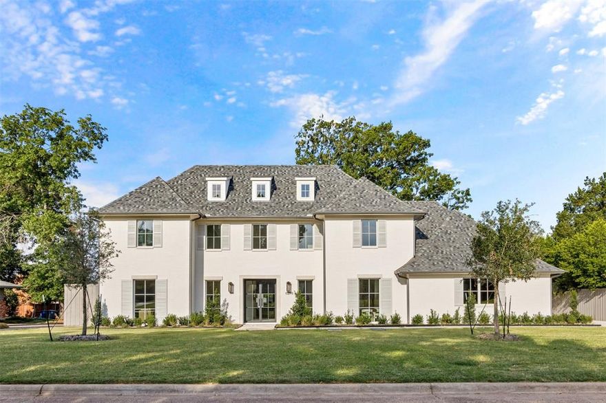 Experience this timeless new construction by Olerio Homes, located over a third-acre lot. Appointed in a timeless palette of marble & natural wood, this home boasts an open floor plan for seamless entertaining & comfortable living that will appeal to the most discerning tastes. Amenities include a chef's kitchen highlighted by Wolf-Subzero appliances, a dedicated study, formal dining, a patio power screen, three car garage, and a private guest suite with future pool bath access. The first-floor owner's suite overlooking the backyard is flooded with natural light, and the second floor-offers a game room, media room, flex room, and all bedrooms with ensuite bathrooms. Featuring only the highest-end designer finishes, including Marvin windows, Kohler plumbing fixtures, Visual Comfort lighting, Walker Zanger tile, and Emtek hardware, to name a few.