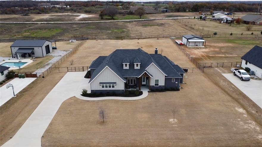This is the kind of place people are looking for right now—space to spread out, no HOA telling you what to do, and a home that’s built to last. Set on a fully sprinkler-irrigated one-acre lot, this custom home offers privacy, peace, and the freedom to live the way you want. Inside, the open layout is warm and welcoming, filled with natural light and designed for everyday comfort. The kitchen is the heart of the home, opening to living spaces where family dinners, game nights, and holidays naturally come together. A private office makes working from home easy, and four spacious bedrooms give everyone room of their own. The oversized three-car garage is perfect for trucks, tools, and weekend projects. Outside, there’s plenty of room for a garden, a pool, a shop, or just wide-open space to enjoy the quiet. Paid-off solar panels keep monthly costs down and add peace of mind. It’s the best of small-town living—room to breathe, lower expenses, and a solid home you can settle into for years to come.

**Solar Panels are PAID OFF**