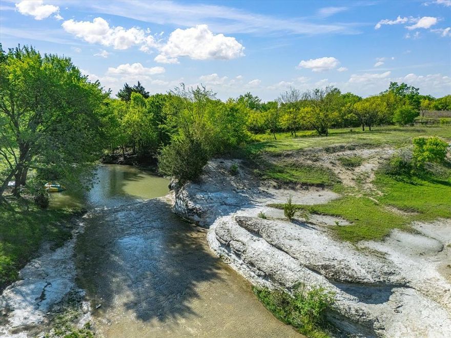 Nearly 18 Acres, No City Taxes, Creek, No Restrictions, Rare Opportunity. Properties like this are getting harder and harder to find. 
This property offers a unique blend of usability and natural beauty, featuring a 3 bedroom, 3 bath home and a stocked creek running through the land, creating a private, peaceful setting that’s perfect for enjoying the outdoors, running livestock, or simply having space to breathe.
The infrastructure is already in place with a gated entrance, electric gate, and security cameras, plus a well-equipped barn or shop with concrete flooring, hay dock, horse stalls, and pipe fencing, along with a round pen and additional large shop space ideal for horses, equipment, or business use.
Whether you’re looking to build a multi-generational setup, start a ranch, run a business, or hold land with long-term upside, this property checks all the boxes.