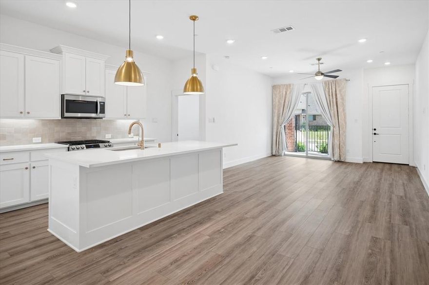 Discover the perfect blend of style and sustainability with this smart-sized, energy-efficient townhome nestled in the heart of Wylie. Featuring 3 thoughtfully designed bedrooms, 2.5 baths, and a spacious 2-car garage, this residence invites sophisticated urban living with a touch of suburban charm. Inside, the home showcases a seamless flow with modern contemporary finishes: an open-concept living area with abundant natural light, beautiful plantation shutters, a sleek kitchen outfitted with stainless steel appliances, and elegant countertops complemented by chic cabinetry. Whether it's hosting dinner parties or enjoying a quiet meal, the kitchen serves as a central hub of the home. The main living space transitions effortlessly into a cozy dining area, perfect for both intimate gatherings and larger celebrations. Downstairs, the primary suite offers a tranquil oasis complete with a well-appointed en-suite bath, featuring dual sinks and a spacious walk-in closet, enhancing both privacy and luxury. The additional two bedrooms upstairs are versatile and can be easily adapted for sleeping, home office, or hobby spaces. Step outside to find a charming patio area, ideal for plants or simply soaking in the warm Texas sun. The low-maintenance yard provides the perfect canvas for gardening enthusiasts or those who appreciate a bit of greenery without the upkeep. Built with energy efficiency in mind, this home is equipped with modern eco-friendly features that reduce utility costs while minimizing their environmental footprint. Its strategic location offers convenient proximity to local shopping, dining, and recreation, making it a desirable address for those seeking comfort and convenience. Experience the best of contemporary living in this impeccable Wylie townhome. With its balance of comfort, efficiency, and modern design, it stands out as a truly exceptional find in today's market. Close proximity to school for easy commute.