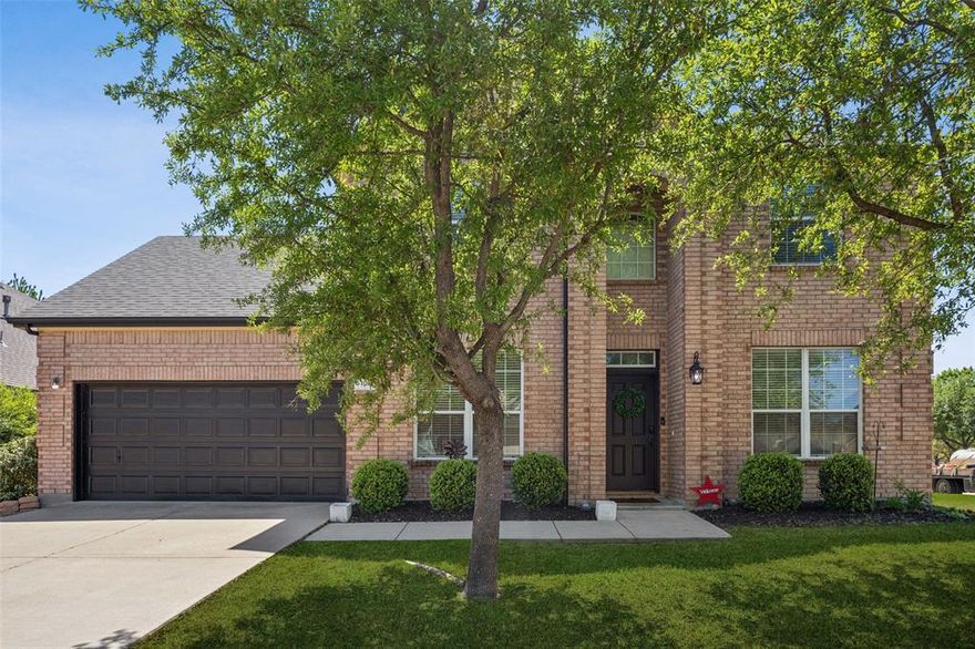 Stunning 5-Bedroom Corner Lot Home in Fort Worth with Luxurious Upgrades! Welcome to this breathtaking 5-bedroom, 2.5-bath home nestled on a spacious corner lot in a peaceful Fort Worth community. From the moment you enter, you’re greeted with warmth and elegance. The grand entryway is flanked by a formal living and dining room, perfect for entertaining or relaxing in style. This inviting home designed with all five bedrooms upstairs, allowing guests to enjoy the well appointed downstairs with large eat-in kitchen and ample space for hosting gatherings. At the heart of the home, the  family room features a cozy fireplace and a wall of windows that fills the space with natural light. It flows seamlessly into the updated modern eat-in kitchen, complete with a large island with seating, built-in appliances, chic designer lighting, a stylish backsplash, and a sunny breakfast nook. The spacious primary suite is a true retreat with a separate sitting area and spa-like ensuite offering dual sinks, a standalone tub, a separate shower, and generous walk-in closets. Four additional bedrooms provide flexibility, with the fifth easily functioning as a media or flex room to suit your lifestyle. Enjoy your private backyard oasis, featuring a large L-shaped patio with dual cedar overhangs—ideal for year-round entertaining. Updates in 2021 include: New floors, paint, updated kitchen and bathrooms, New roof and gutters, 6-inch baseboards and crown molding on the first floor, New windows and rear door on the first floor. Custom holiday lights convey! Enjoy nearby walking trails and top-notch community amenities in this thoughtfully updated and beautifully maintained home. A must-see! 3D tour available online.