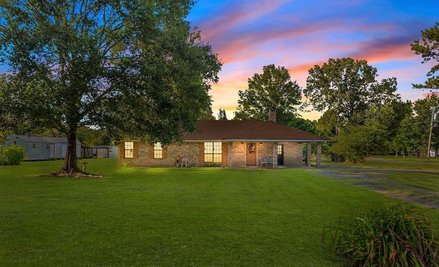 $4,000 BUYER INCENTIVE!!! 
Enjoy peaceful country living just minutes from town in this meticulously maintained, one-owner home situated on nearly an acre. This 3-bedroom, 2-bathroom gem features wood-look tile flooring throughout, offering both durability and timeless style. The spacious living room boasts a cozy wood-burning fireplace, perfect for gathering with loved ones. The semi open floorplan flows into a kitchen filled with real wood cabinetry, ample counter space, and a layout that makes cooking and entertaining a breeze. The large laundry room offers additional storage and convenience. Generously sized bedrooms provide comfort for the whole family, with a primary suite that includes a private bath and stand-up shower. Just off the dining area, you'll find a bright sunroom ideal for a home office, playroom, or relaxing retreat. Step outside to a picturesque backyard complete with a covered patio, two powered storage sheds (12x20 and 12x24), a four-kennel dog run, and a large wood rack all included. Mature Mayhaw trees add a touch of natural charm. Additional updates include a 3 year old roof and HVAC system, and a recently serviced septic. This home offers the perfect blend of rural tranquility and modern convenience, schedule your private showing today!

QUALIFIES FOR ZERO DOWN USDA RURAL DEVELOPMENT LOAN!!!