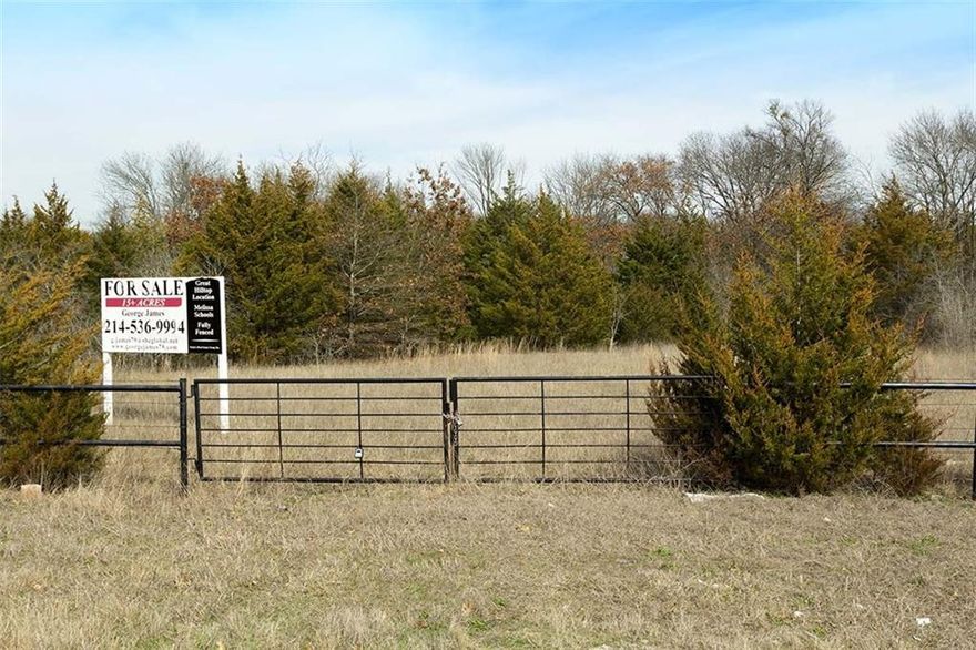 Beautiful 15 acres on top of hill overlooking gorgeous views.  Heavily treed, this is the perfect place to build your home or have your entire family live in multiple homes.  Fully fenced, wonderful location.  Small exemplary school district.