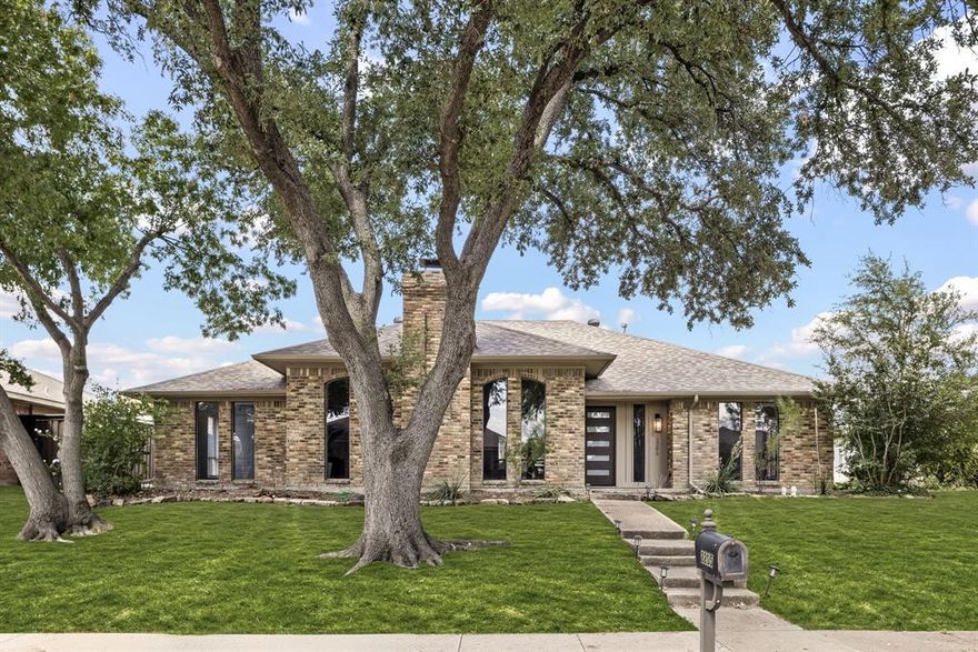 Nestled on a quiet street in the established Woodcreek neighborhood, this beautifully updated 4-bedroom, 3-bathroom home offers abundant natural light and an open-concept design. Bright interiors feature soaring ceilings, expansive windows and luxury vinyl plank flooring throughout. The inviting living room with a cozy fireplace flows seamlessly into the dining area, while the renovated eat-in kitchen boasts ample storage, modern cabinetry, updated appliances, and a charming breakfast nook. The oversized primary suite includes private patio access and a newly refreshed bath with a walk-in shower, dual vanities, and generous closet space. Three additional bedrooms and two full baths provide plenty of room for family or guests. Enjoy the elegant covered patio—perfect for outdoor dining and entertaining—surrounded by mature trees. Ideally located just minutes from shopping, dining, entertainment, and major highways, this home combines comfort, style, and convenience.