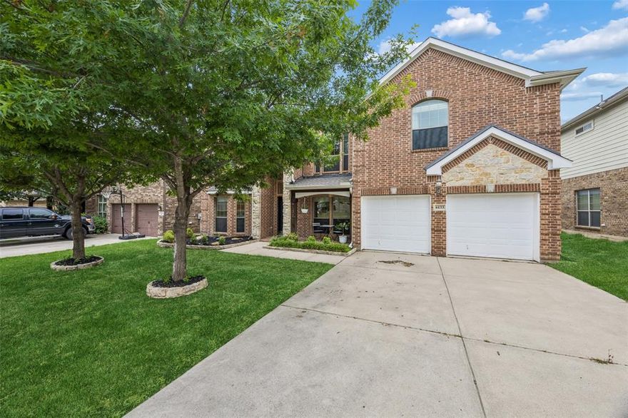 Exceptionally maintained 4-bedroom, 3.5-bath Fort Worth home backing to greenspace and a community trail! This bright and airy open-concept home warmly welcomes you with dramatic soaring ceilings, a stunning spindle staircase, and abundant natural light throughout. The spacious family room sits at the heart of the home and features a stately fireplace, soaring ceiling, large windows, and beautiful greenbelt views. Designed for both everyday living and entertaining, the impressive eat-in kitchen offers a breakfast bar, island, built-in appliances, ample storage and prep space, and a bright breakfast nook. The formal living and dining rooms are ideal for hosting guests, while the elegant home office provides a quiet and functional workspace. The serene downstairs primary suite is a true retreat with a cozy sitting area, fantastic backyard views, and an ensuite bath featuring dual sinks, a separate shower, and a large walk-in closet. Upstairs, spacious secondary bedrooms and baths are complemented by an additional family room, offering flexible living space for a variety of needs. Enjoy peaceful outdoor living from the backyard deck with direct access to the greenbelt and jogging path. With no neighbors behind the home, you’ll appreciate the added privacy and scenic surroundings. Excellent location with convenient access to community amenities, nearby lake access, shopping, dining, and major highways. This Fort Worth gem offers space, comfort, and an exceptional setting both inside and out! 3D tour available online!