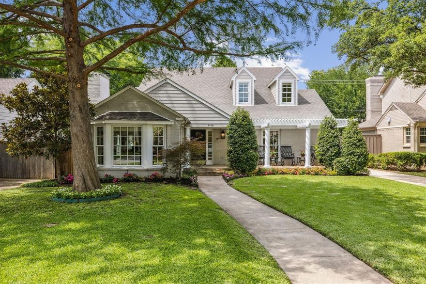 Do you dream of owning a home to make family memories in the heart of the Park Cities? Look no further than 4408 Southwestern zoned for Hyer Elementary. Entertain in the dining room with a fireplace and enjoy after-dinner conversation in the adjoining sitting room. The custom open kitchen with its wood countertops, stainless appliances, and granite island opens to the den which has vaulted ceilings, fireplace, and built-in shelves. The primary bedroom is on the first floor with an en suite bath has recent flooring, marble countertops and soaking tub. A secondary room on the first floor is an office; it easily converts to a fifth bedroom, with a full bath across the hall. Host guests here or in the one-bed, one-bath back-house. Upstairs, there is a TV or working space area, and three more bedrooms. Two have attached bathrooms, and one has across the hall access to a full bath. The turf backyard is a must see with a covered stone patio, fireplace, a putting green, and a dog run.