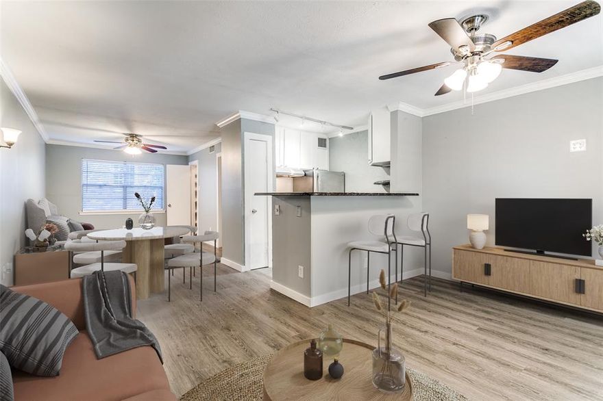 LOCATION!  This open, cozy, one bed, one bath home staged in heart of Highland Park.  Walk to shopping with Whole Foods, Highland Park Village down a few blocks or quick commute heart of the city.  Convenient to SMU, night life, American Airlines Center, HWY 75 and 35 and DNT all within minute by car.  Need closet space? This has it!  One assigned parking spot, laundry on site, Security gates for walk in entrance, located on second floor for privacy.