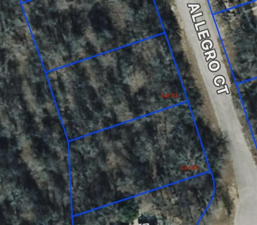 Treed lot in Runaway Bay TX.  Build your dream home just minutes from Lake Bridgeport where you can enjoy fishing and water activities.  Close to community pool.  Lot 33 is also available so you can have more privacy or room to roam. No RV's or mobile homes.Easy commute to Jacksboro, Denton  and Fort Worth.