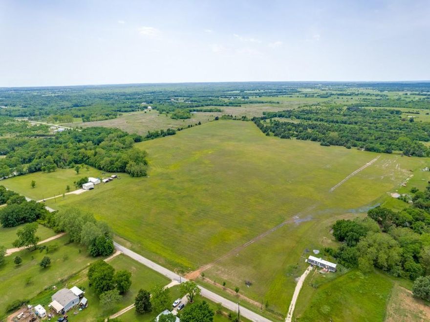 Welcome to Wide Open Possibility — 15 Acres of Pure Texas Potential. Developers Welcome!

If you've been dreaming of wide skies, sandy soil underfoot, and a place where both your horses and your heart can roam free, this 15-acre gem just west of US Hwy 377 may be your final stop. Located on a hard-surfaced county road with easy access to Lake Texoma and the best of North Texas living, this tract is flat, clean, and completely usable—no gullies, no wasted corners, just land that’s ready to work with you.

Ag-exempt and horse-friendly, the soil here is sandy and ideal for riding arenas, homesteads, or just letting your animals kick up their heels. With community water access at the road and expansive views in every direction, this is the kind of property where your vision—whether it’s building a custom home, planting an orchard, or finally creating that self-sustaining ranch—can truly take root.

Oh, and for the planners and big thinkers: there’s an adjacent 15-acre tract available (MLS 20973460) if 15 just isn’t enough. Whether you want more elbow room or a buffer from the rest of the world, you’ve got options. Expand even more with the adjacent home, shop garage with 16 acres which is for sale (MLS 20916548).

One thing to note: developers are welcome. It's rare to find acreage this clean, this flat, and this well-located in such a desirable area—especially just minutes from the lake and near the charm of small-town Texas life.

So go ahead. Walk the fence line, breathe the air, and start imagining what life could look like when it’s lived on your own terms—on your own land.