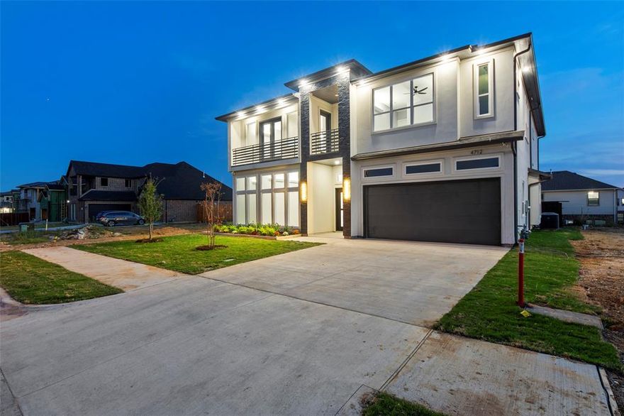 Premium, contemporary, extra large home in Valencia Estates, Irving TX. 4800sqft AC area on a 7200sqft lot. The total area under roof is nearly 5,500sqft with a spacious patio. Extra high ceilings throughout the house with plenty of windows brings in abundant natural light. Downstairs features a large master suite & guest bedroom. Second floor has an additional master suite & 3 more bedrooms. There is a laundry room down & another one upstairs for added ease. The house features high end finish out including indirect lighting in living areas, stucco ext, upgraded appliance package, Quartz countertops, pot filler, epoxy finished garage floors, High Lift Garage & much more! It is a quality built house with a functional layout with room for even a large family and plenty of space to entertain guests. A minute away from President George Bush Turn Pike and HWY 183 for an easy commute! And this home is so close to DFW airport you don’t have to cross even a single signal to get to the airport!