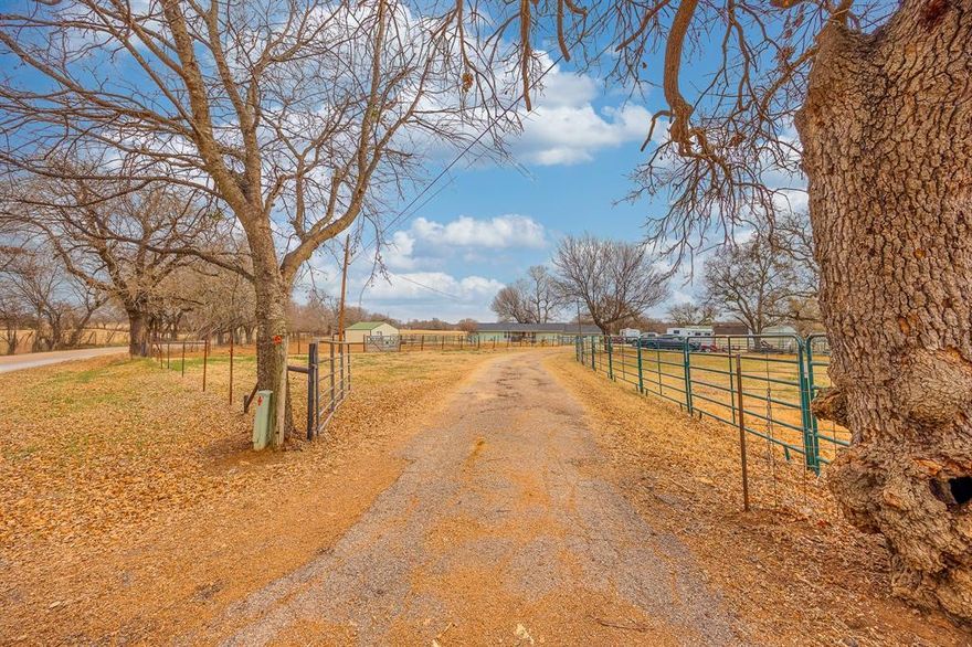 Bring your horses, cows, sheep, or goats!!! Hear is just under 2000 square foot 3-bedroom 2 bath 2 car garage home in the country on over 4 acres. If you have children, it is indeed located in the very sought out Grandview, Texas school district. The home has a large open concept kitchen with an island and dining room which is large enough to be split and used as a 2nd living room and dining room. The laundry room is roomy enough and is currently being utilized as a laundry room and office. Right off of the dining room is a spacious living area with a door that leads outside under the mature shade trees. Down the hall the home has two great sized bedrooms with walk in closets and a shared bath. Continue down the hall to a very large primary bedroom with a large walk-in closet and a 4-piece ensuite. Outside the property is fully fenced and cross fenced. It is equipped with a 12x40 loafing shed or horse barn with tack room and horse runs, a 20x30 barn with a door on one end and a lean-to on the other end with a lot for horses, and a 10x10 storage building. The zero turn lawn mower in the garage may convey with the property depending on price agreed upon. Property was updated with a new roof in 2019, hot water heater in 2024, and a HVAC in 2025. Book a showing before this amazing property is swept up!!!
Buyer and buyer's agent will need to verify all information including but not limited to measurements. All information deemed reliable but not guaranteed.