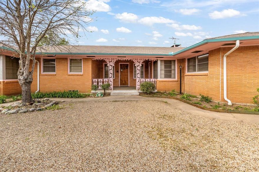 Step into timeless charm with this beautifully maintained mid-century home in Fort Worth, perfectly positioned on an elevated corner lot with sweeping views of Rockwood Golf Course. Built in 1950, this 3-bedroom, 2-bath residence offers 2,254 sq ft of living space plus an additional 230 sq ft studio with a full bath—ideal for guests, rental income, or a private workspace.

Inside, you’ll find refinished original wood floors, crown molding, chandeliers, oversized windows, and two wood-burning fireplaces that showcase the home’s authentic character. The spacious layout offers abundant storage and natural light throughout. The vintage kitchen maintains its original charm with ample cabinetry and workspace, while the living areas provide flexibility for modern living.

The detached studio adds incredible versatility, making this property perfect for investors, creatives, or multi-generational living.

Situated on a 0.2755-acre lot, the property features a perimeter fence, automatic gated entry, a separately fenced dog run with shelter, a 2-car garage, and an attached 2-car carport.

Conveniently located just minutes from the historic Fort Worth Stockyards and with quick access to HWY 199, this property offers both lifestyle and investment potential. A rare opportunity to own a piece of mid-century character with endless possibilities!