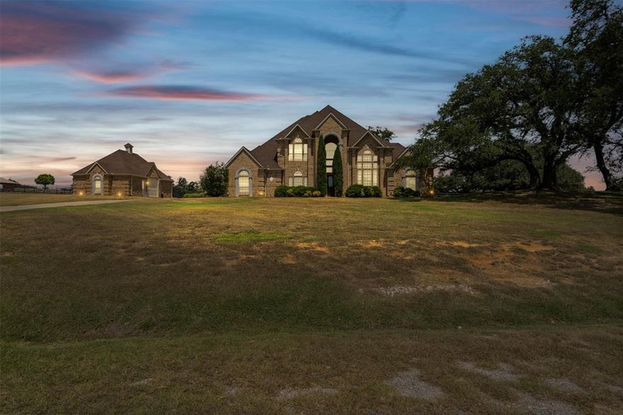 Welcome to this exceptional 5-bedroom, 3.5-bathroom home offering more than 4,100 square feet of living space, perfectly situated on just over 4 acres in an exclusive, gated community. From the moment you arrive, you’ll appreciate the sense of privacy and tranquility that surrounds the property, enhanced by the fully fenced perimeter and wide-open views of the Texas landscape. Thoughtfully designed to blend comfort, functionality, and versatility, this home provides the perfect balance of modern amenities and country living. The home features generously sized bedrooms, each offering comfort and privacy. The expansive primary suite serves as a private retreat, complete with an ensuite bathroom designed for relaxation and convenience. Additional bedrooms are spacious and versatile, perfect for family, guests, or even creating dedicated home offices or hobby spaces. With multiple living and gathering areas throughout, the home provides plenty of options for quiet evenings at home or hosting larger get-togethers. A additional detached garage adds even more functionality to the property, offering additional parking, storage, or workshop space. For those seeking relaxation and wellness at home, a private sauna provides the perfect spot to recharge and unwind. Horse lovers and outdoor enthusiasts alike will appreciate the unique amenities this property offers. The barn features a loft room, 2 stalls with turnouts and a round pen.  Complemented by access to a community-covered arena walking distance away, making it ideal for training, riding, or leisure. Beyond equestrian use, the more than 4 acres provide endless opportunities—whether you dream of gardening, creating outdoor entertaining spaces, or simply soaking in the privacy and quiet that comes with owning your own piece of land. This home truly gives you the freedom to shape the lifestyle you’ve been envisioning.