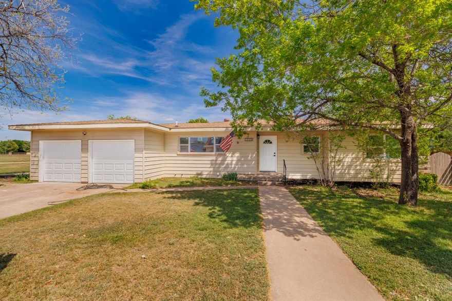 Agent Owner. Welcome home to this beautifully updated 4 bedroom, 2 bath gem that perfectly blends style and comfort. The kitchen is a true standout, featuring all new stainless steel appliances, sleek quartz countertops, a modern backsplash, and on trend fixtures, plus a convenient coffee bar with floating shelves that adds both function and charm. The dining room is designed for gathering, complete with built in cabinets and a cozy electric fireplace, creating the perfect space to host family and friends. The living room is filled with natural light and offers its own electric fireplace along with built ins, making it a warm and inviting place to relax. The spacious primary suite feels like a private retreat with a large walk in closet and an ensuite bathroom that delivers a hotel like experience, featuring separate vanities, a beautifully tiled shower and tub combo, and a linen closet for added storage. Step outside to enjoy a covered patio and a generously sized backyard with plenty of room to entertain, play, or unwind. This home truly has it all with thoughtful updates and modern touches throughout.