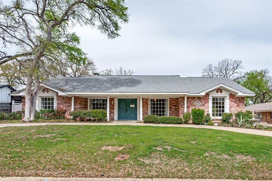 Welcome to this home showcasing original custom features and offering a wonderful opportunity for its next owner to bring their vision to life and make it truly their own. This charming single-story brick home is filled with character, space, and plenty of potential! Nestled in an established neighborhood shaded by mature trees, this property offers an opportunity be in a location just minutes from it all. Step inside to discover formal living and dining rooms—perfect for entertaining or gathering with family and friends. The living room serves as the heart of the home, featuring a cozy wood-burning fireplace that adds warmth and timeless appeal. The kitchen is designed with functionality in mind, offering an island workspace and custom wood cabinetry. Throughout the home, you’ll appreciate the solid wood doors and numerous built-in features that add both charm and practicality. The primary suite includes two walk-in closets, providing abundant storage. Two secondary bedrooms are thoughtfully connected by a convenient Jack and Jill bathroom, ideal for family or guests. Located with easy access to both Interstate 30 and Interstate 820, and just ten minutes from downtown Fort Worth, this home combines comfort, convenience, and opportunity. Bring your vision and make this property your own!