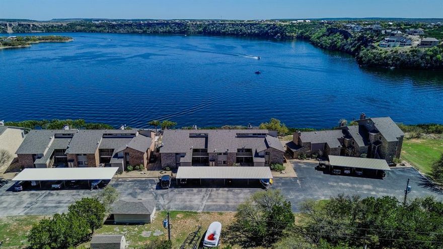 Welcome to a lake retreat that highlights the relaxed, easygoing lifestyle people love about Possum Kingdom Lake. Located in Gaines Bend, this condo offers convenient access to nearby marinas, restaurants, and lake amenities while still providing a quieter setting to unwind and enjoy the water.

Positioned within a lakefront community, the property allows for low-maintenance ownership with more time spent enjoying the lake and less time managing exterior upkeep. Whether you're looking for a weekend getaway, investment opportunity, or a simple place to escape, this property offers flexibility to fit a variety of uses.

The interior features a functional layout with an open living and kitchen area, creating a comfortable space to gather after a day on the water. Large windows allow for natural light and glimpses of the lake, while the existing finishes provide an opportunity for a buyer to update and customize to their personal style over time.

Outdoor living is a key highlight, with easy access to the water and shared community spaces designed for lake enjoyment. Spend your days boating, swimming, or relaxing by the shoreline, then unwind in the evenings with peaceful lake views and sunsets over Palo Pinto lake country.

Gaines Bend is known for its central lake location and accessibility, making it a desirable area for both full-time residents and weekend visitors. This property presents a chance to get into the Possum Kingdom Lake market at an approachable price point while adding value through future updates.