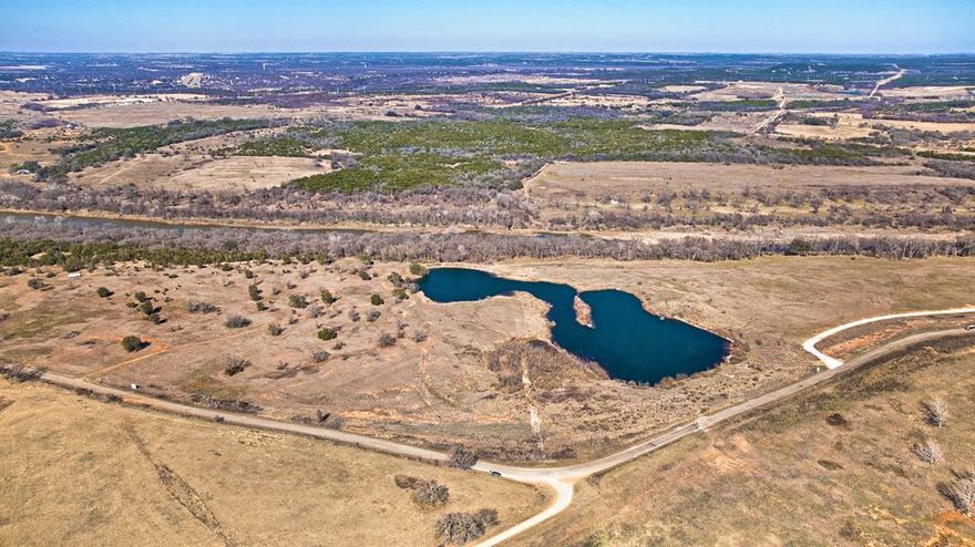 Welcome Home to the Premier Brazos River Ranch Subdivision located in Granbury! 16 total lots spanning almost 100 acres and we have already presold 4 of them. Lot 7 is just over 7.1 acres and available. A majority of these parcels have exclusive access and back up the the Brazos River - Perfect to build your retirement and dream home on or purchase as an investment and watch the value appreciate. There is water available by well and there is electricity available at the road on each parcel. Each of these lots are also COMPLETELY UNRESTRICTED. Seller financing is also available - See MLS Transaction desk for specific terms. Only an hour and a half from Dallas and 1 hour from South Fort Worth these make an amazing weekend getaway. Survey is also available. Make an offer before someone else does!